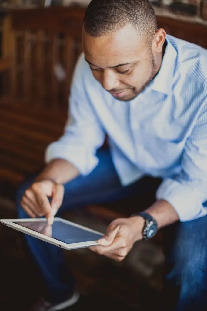 guy-using-church-software-tablet