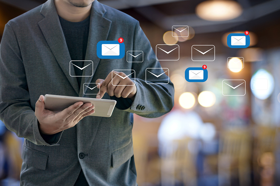 A person on a tablet sending email communication to their church members using a simple to use church software like IconCMO. A person on a tablet sending email communication to their church members using a simple to use church software like IconCMO.